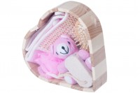 Set of bathroom accessories in wooden basket heart