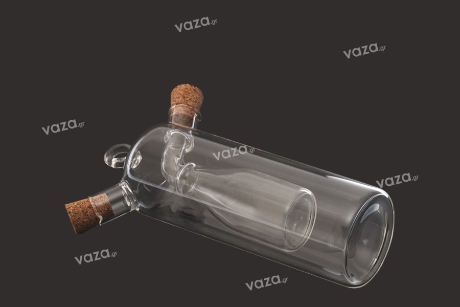 Flacon de sticlă cu "două compartimente" împreună cu 2 dopuri conice din plută naturală și cu inel de agăţat. Lucrare manual din sticlă suflată