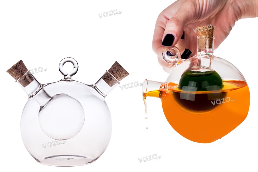 Bottiglia di vetro con due compartimenti    a forma di sfera con 2 tappi di sughero a forma conica. Fatto a mano in vetro soffiato - 414 ml.
