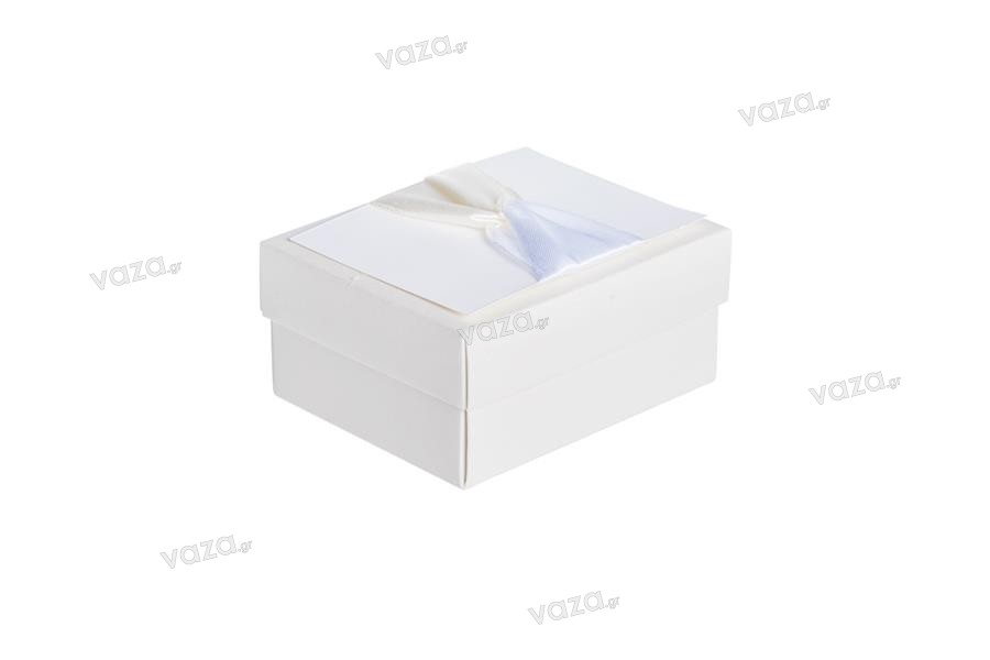 Boîte en papier blanc avec nœud beige et satin