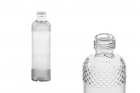 Transparent 330ml glass bottle with relief surface on neck and lower part 