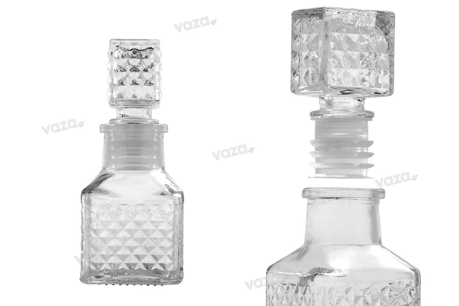 Bottiglietta da 60 ml in miniatura, misura 106x44 mm, con disegni in  rilievo e tappo di vetro.