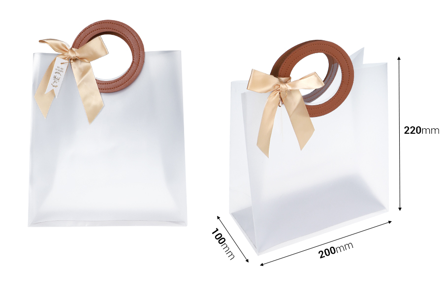Gift bag plastic 200x100x220 mm semi transparent with bow and handle in leather texture - 12 pcs Gift bag plastic 200x100x220 mm semi transparent with bow and handle in leather texture - 12 pcs