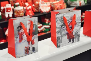 Christmas paper gift bag with ribbon handle in size 180x100x230 mm - 12 pcs-bildgruppe