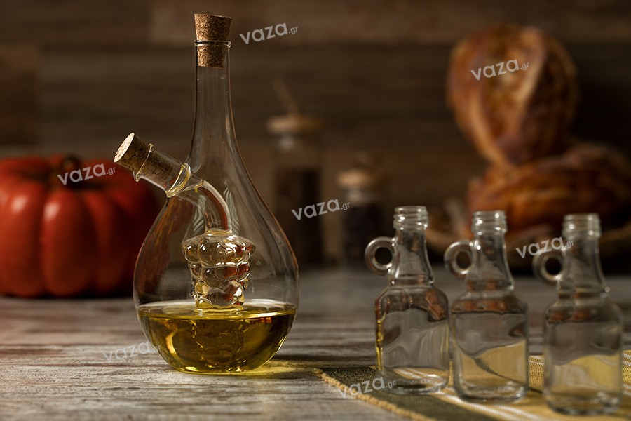 Bottiglia di vetro  con due compartimenti a forma di 