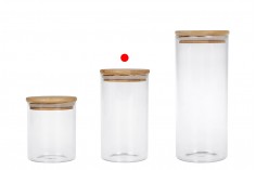 700 ml round glass jar with rubber sealed wooden lid.