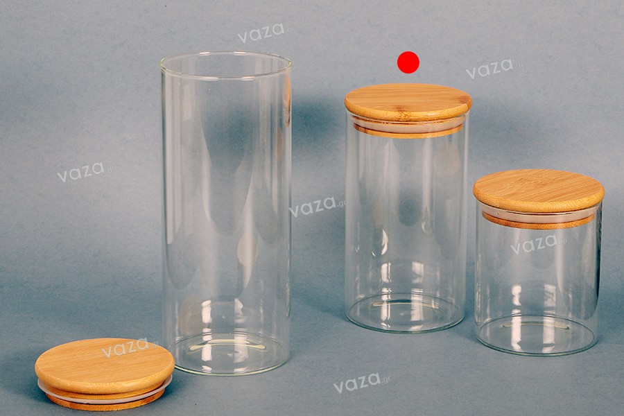 700 ml round glass jar with rubber sealed wooden lid.