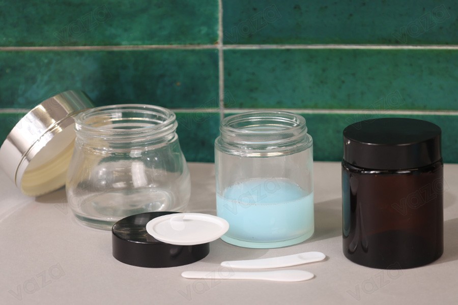Barattolo di vetro 100 ml trasparente con coperchio in plastica nera (e sigillo interno sul coperchio) Barattolo di vetro 100 ml trasparente con coperchio in plastica nera (e sigillo interno sul coperchio)-εικόνα_σύνθεση