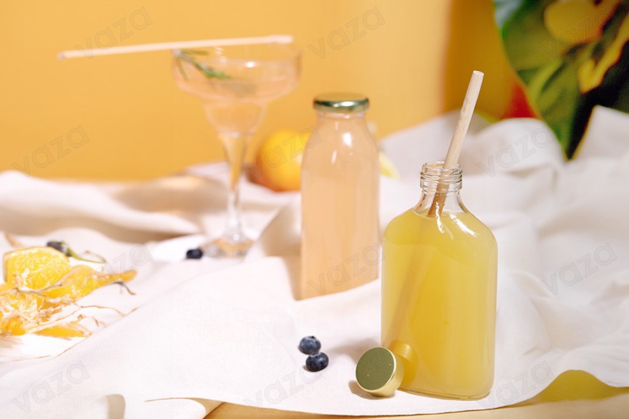 Bouteille de 100 ml en verre de forme plate - flacon-photo_groupe