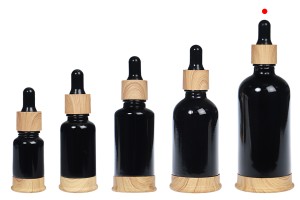 Shishe qelqi 100 ml e zezë me pikatore plastike dhe bazë në dizajn druri-bildgruppe