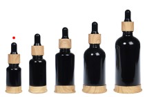 Shishe qelqi 10 ml e zezë me pikatore plastike dhe bazë në dizajn druri-bildgruppe