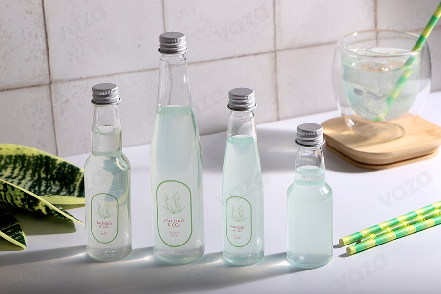 Μπουκαλάκι πλαστικό διάφανο 100 ml με ασημί αλουμινένιο καπάκι και εσωτερικό liner-εικόνα_σύνθεση