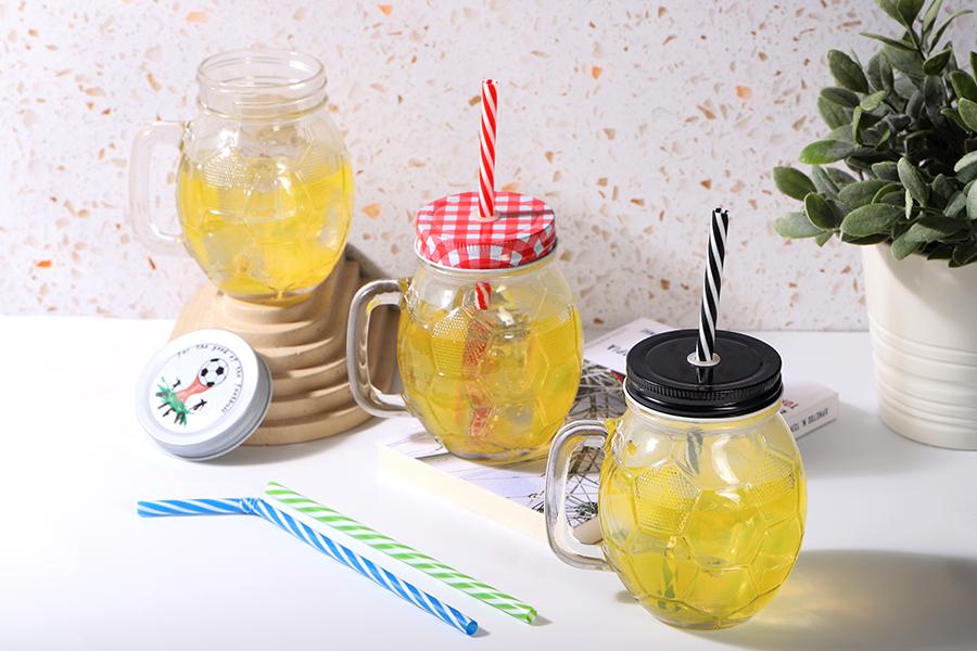 Glass Jar 450 ml football shaped 126x94 mm with silver cap Glass Jar 450 ml football shaped 126x94 mm with silver cap
