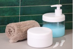 White jar cap with cream dispenser pump