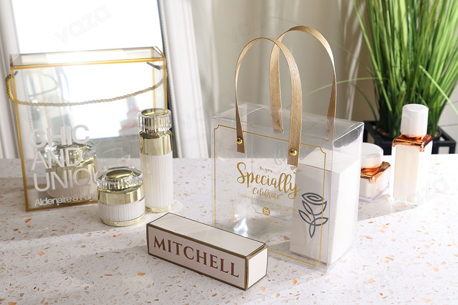 Boîte - sac cadeau 150x75x150 mm plastique transparent avec poignée - 12 pcs Boîte - sac cadeau 150x75x150 mm plastique transparent avec poignée - 12 pcs-photo_groupe