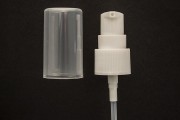 Plastic cream dispenser pump with transparent overcap and PP20 finish. 