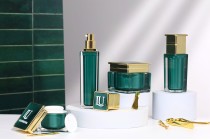 Luxury acrylic bottle 100 ml in emerald color with cream pump and cap Luxury acrylic bottle 100 ml in emerald color with cream pump and cap-image_group