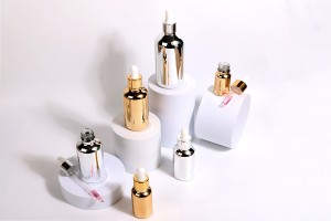 Glass bottle for essential oils 50 ml with PP18 neck in gold or silver color-image_group