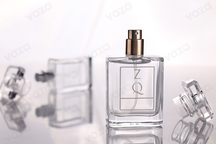 Φιάλη αρωμάτων γυάλινη 50 ml διάφανη με σπρέι και καπάκι-εικόνα_σύνθεση