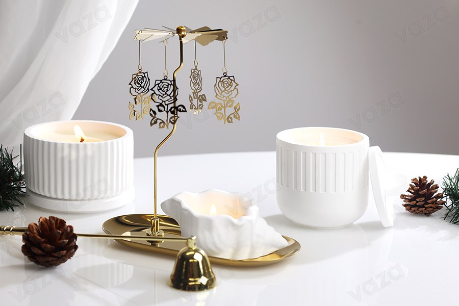 Decorative carousel in various designs with gold metal base for tealights or candles Decorative carousel in various designs with gold metal base for tealights or candles-image_group