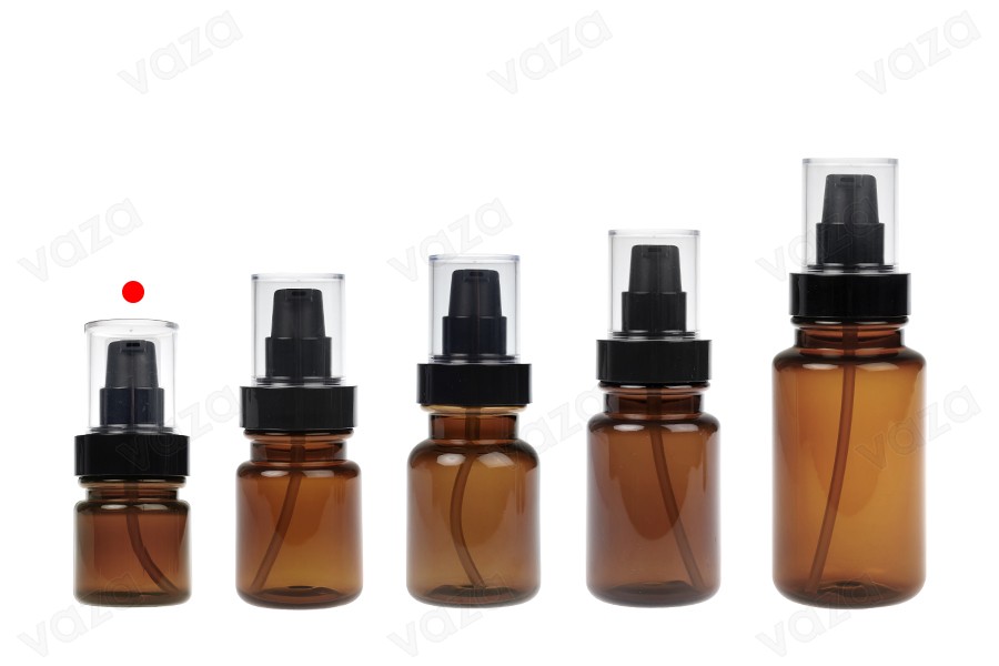 Bouteille cylindrique en plastique de 40 ml avec pompe à crème noire et bouchon transparent. Bouteille cylindrique en plastique de 40 ml avec pompe à crème noire et bouchon transparent.-photo_groupe