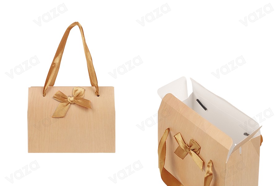 Gift bag with handle and ribbon bow tie in size 130x70x100 mm Gift bag with handle and ribbon bow tie in size 130x70x100 mm-image_product
