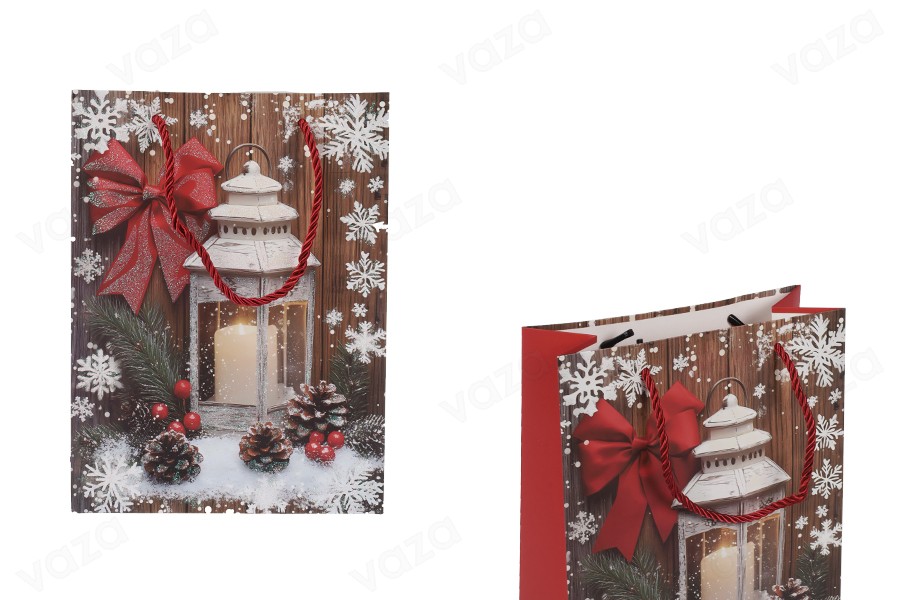 Sac cadeau en papier 180x85x240 mm (210 g) avec un motif de lanterne de Noël et une ficelle rouge pour poignée - 12 pièces. Sac cadeau en papier 180x85x240 mm (210 g) avec un motif de lanterne de Noël et une ficelle rouge pour poignée - 12 pièces.-εικόνα_προϊοντική
