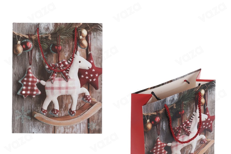 Sac cadeau en papier 260x100x320 mm (210 g) avec un motif de cheval de Noël et une ficelle rouge pour poignée - 12 pièces. Sac cadeau en papier 260x100x320 mm (210 g) avec un motif de cheval de Noël et une ficelle rouge pour poignée - 12 pièces.-εικόνα_προϊοντική