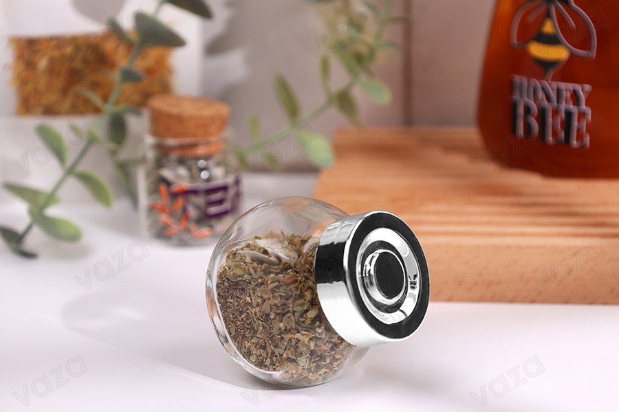50ml tilted glass jar with silver plastic cap. The jar stands upright or tilted-image_group