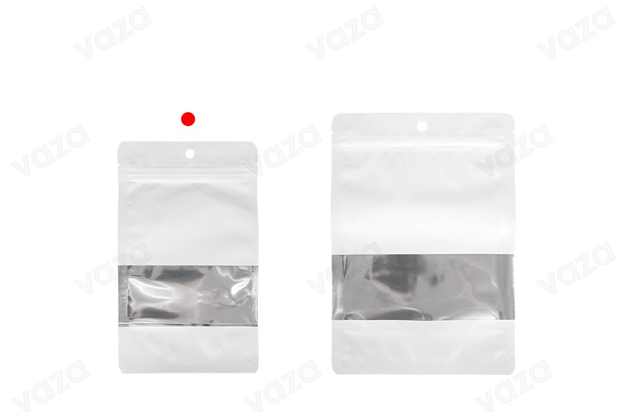 Qese alumini të bardha të tipit Doy Pack 120x40x200 mm, me zipe, dritare dhe mundësi vulosjeje me izolim termik - 100 copë. Qese alumini të bardha të tipit Doy Pack 120x40x200 mm, me zipe, dritare dhe mundësi vulosjeje me izolim termik - 100 copë.-imazh_grup