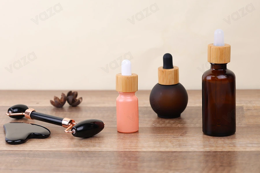 Anneau en plastique avec revêtement en bois pour compte-gouttes de 5 à 100 ml-photo_groupe