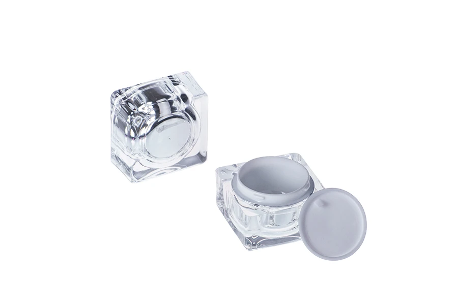 Pot de luxe pour crème de 10ml, acrylique avec joint intérieur sur le couvercle et plastique sur le pot Pot de luxe pour crème de 10ml, acrylique avec joint intérieur sur le couvercle et plastique sur le pot