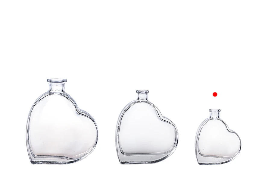 Bouteilles pour faveurs de mariage de 50 ml en forme de coeur Bouteilles pour faveurs de mariage de 50 ml en forme de coeur