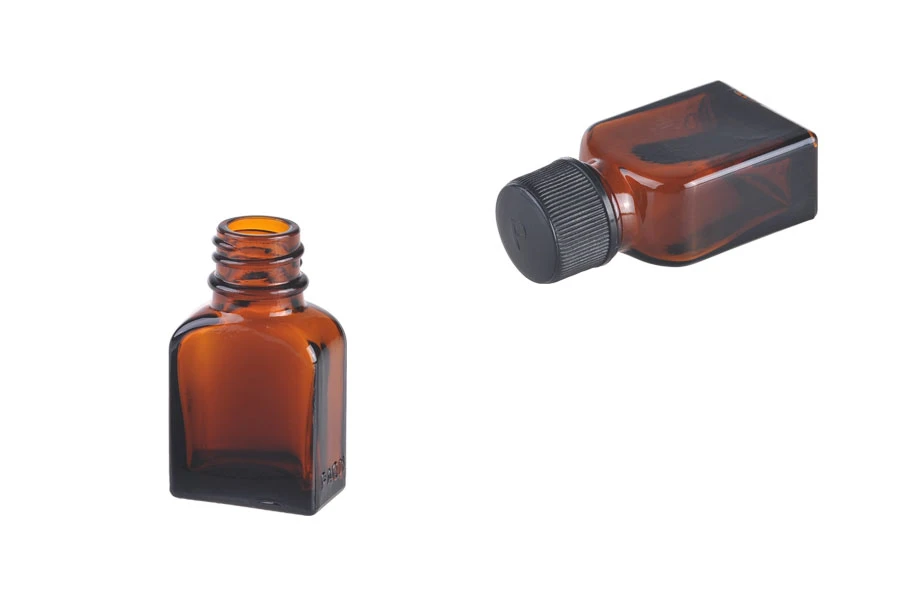 Μπουκαλάκι γυάλινο 8 ml καραμελέ με μαύρο πλαστικό καπάκι και τάπα Μπουκαλάκι γυάλινο 8 ml καραμελέ με μαύρο πλαστικό καπάκι και τάπα