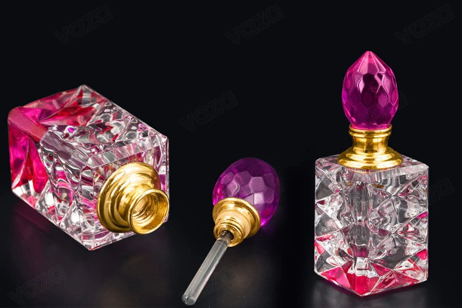 5ml crystal attar bottle with crystal cap and glass dipstick, in 6 colors. 5ml crystal attar bottle with crystal cap and glass dipstick, in 6 colors.-