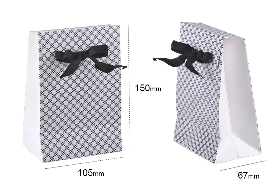Paper gift bag in a special design and print with a 10mm grosgrain ribbon bow tie handle in size 105x67x150 Paper gift bag in a special design and print with a 10mm grosgrain ribbon bow tie handle in size 105x67x150
