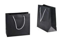 Black laminated gift bag with silver twisted rope handle in size 220x90x210 Black laminated gift bag with silver twisted rope handle in size 220x90x210