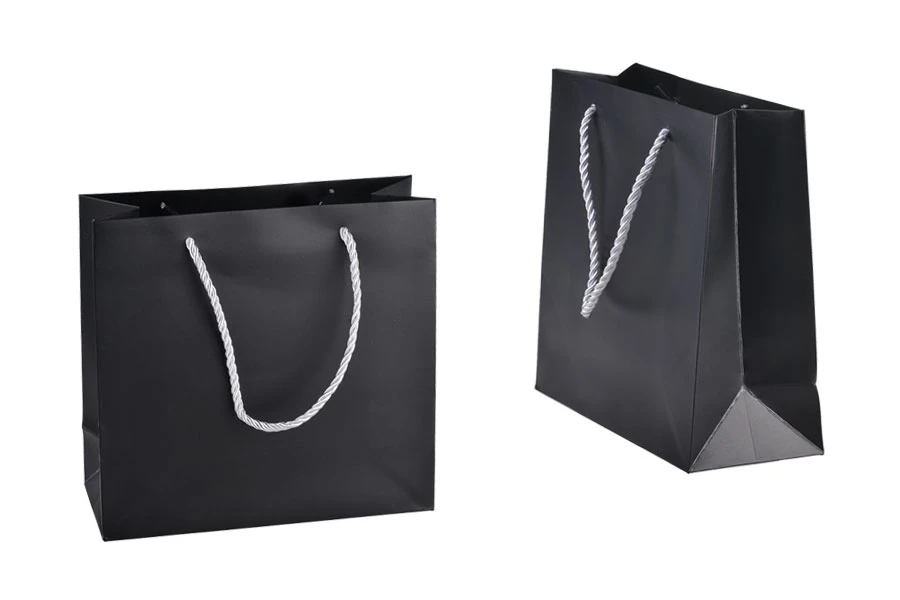 Black laminated gift bag with silver twisted rope handle in size 220x90x210 Black laminated gift bag with silver twisted rope handle in size 220x90x210