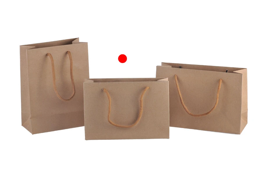 Eco kraft paper gift bag with cotton rope handle in size 190x60x130 Eco kraft paper gift bag with cotton rope handle in size 190x60x130