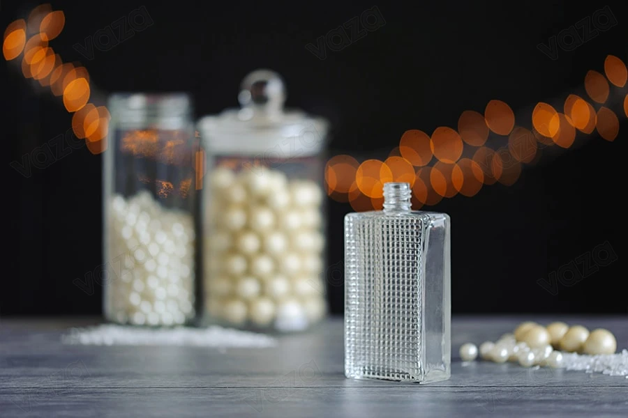 Bottiglia di vetro sagomato per profumi da 90 ml (18/415). Bottiglia di vetro sagomato per profumi da 90 ml (18/415).-gruppo_immagini