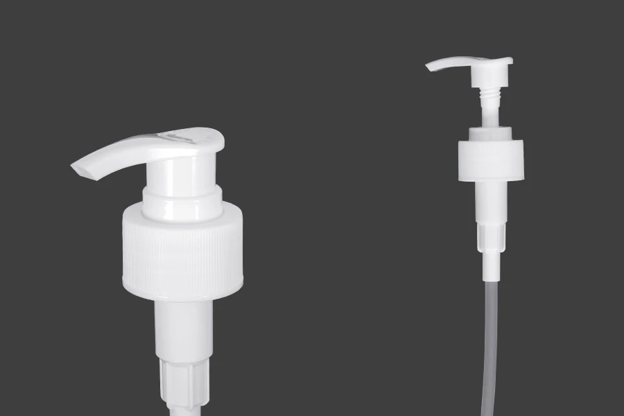 Pompa 28/410 per crema, in plastica bianca con chiusura di sicurezza.