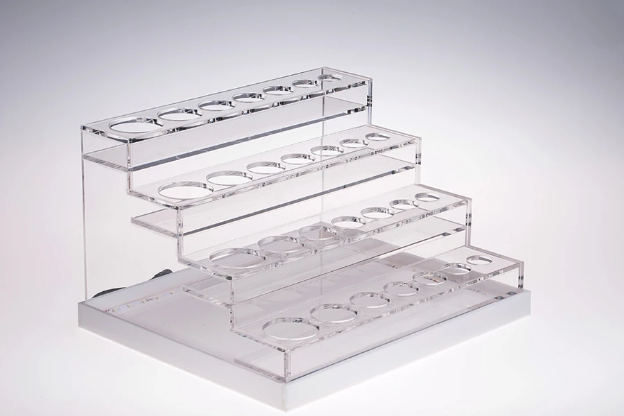 Σταντ (stand) plexiglass φωτιζόμενο με ταινία LED για μπουκαλάκια αιθέριων ελαίων διαφόρων χωρητικοτήτων και βάση λευκή ή μαύρη  - 28 θέσεων