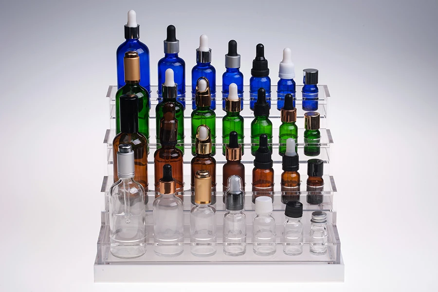 Σταντ (stand) plexiglass φωτιζόμενο με ταινία LED για μπουκαλάκια αιθέριων ελαίων διαφόρων χωρητικοτήτων και βάση λευκή ή μαύρη  - 28 θέσεων