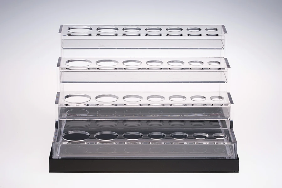 Σταντ (stand) plexiglass φωτιζόμενο με ταινία LED για μπουκαλάκια αιθέριων ελαίων διαφόρων χωρητικοτήτων και βάση λευκή ή μαύρη  - 28 θέσεων