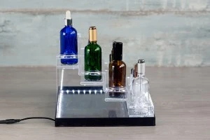 Σταντ (stand) plexiglass φωτιζόμενο με ταινία LED για μπουκαλάκια αιθέριων ελαίων διαφόρων χωρητικοτήτων και βάση λευκή ή μαύρη  - 28 θέσεων-12