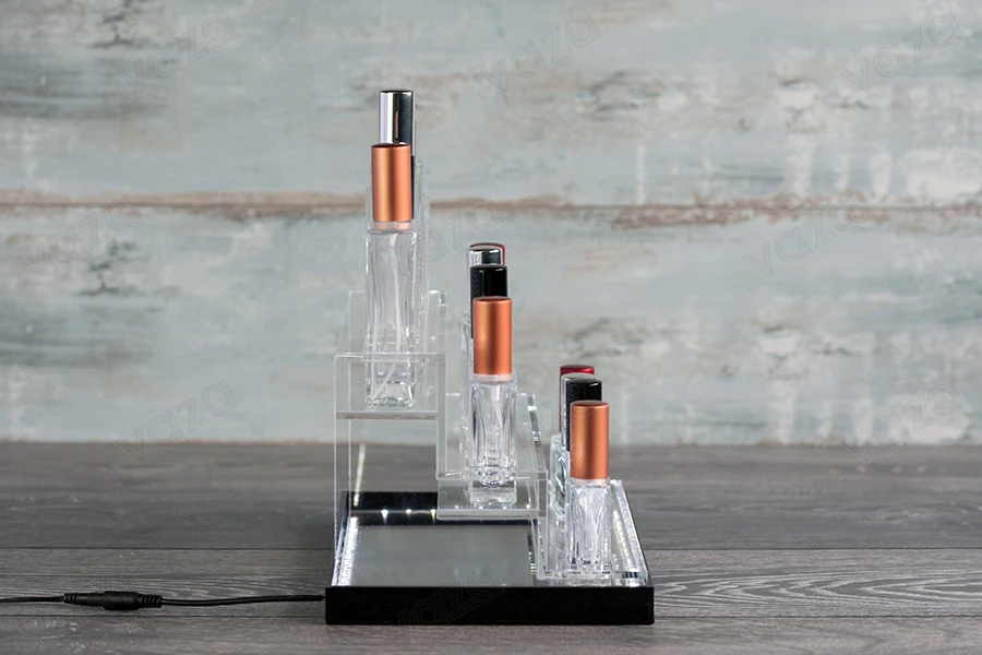 Stand made of plexiglass, with LED lit tape for perfume bottles of various shapes, white or black base - for 12 bottles-εικόνα_σύνθεση