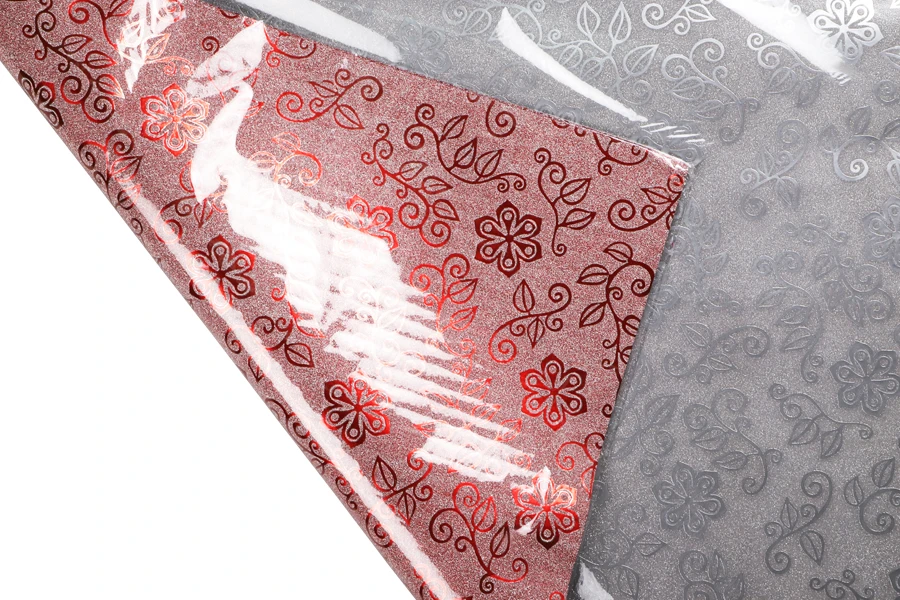Metallic flower pattern cellophane wrapping sheets in size 50x70cm - available in a package with 20 pcs-