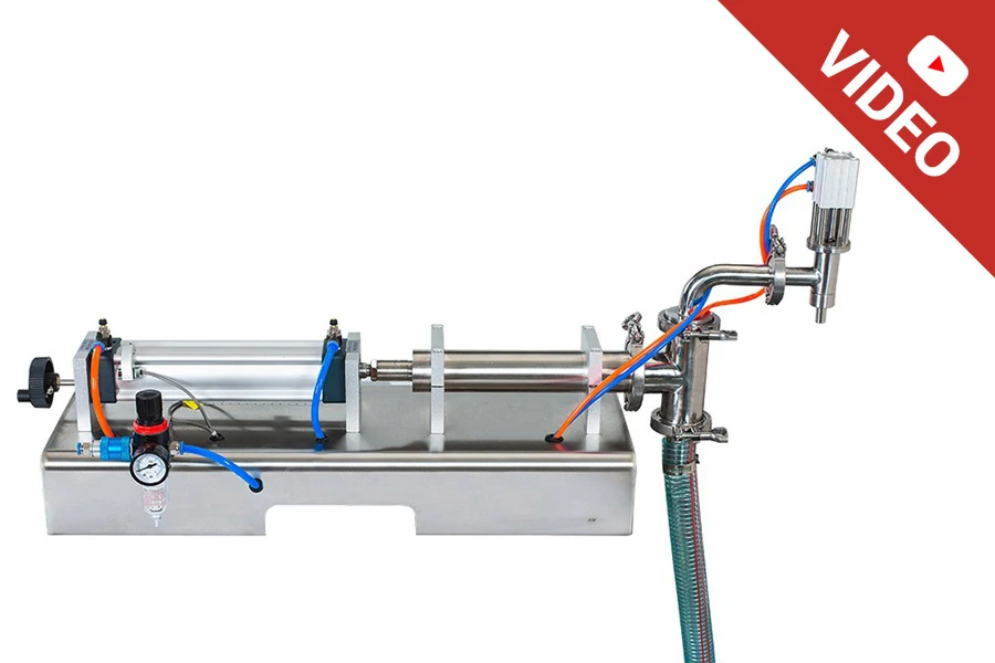 Machine de remplissage de récipients pour liquides par air comprimé (100-1000 ml) Machine de remplissage de récipients pour liquides par air comprimé (100-1000 ml)