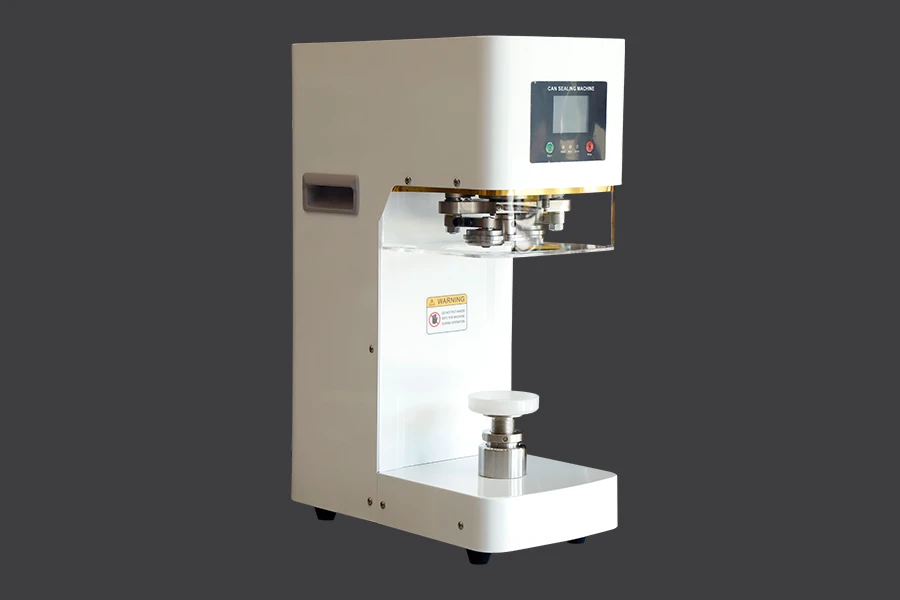 Closing - sealing machine for plastic bottles with aluminum caps Closing - sealing machine for plastic bottles with aluminum caps