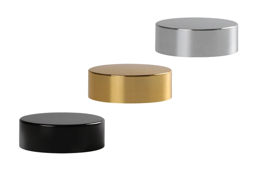 Kunststoffdeckel mit Aluminiumbeschichtung und Innendichtung für 30 ml Gläser Kunststoffdeckel mit Aluminiumbeschichtung und Innendichtung für 30 ml Gläser